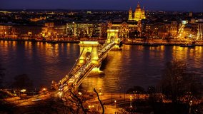 Aerial view of Chain bridge and night Budapest city. Time-lapse video of night city traffic, Budapest, Hungary.