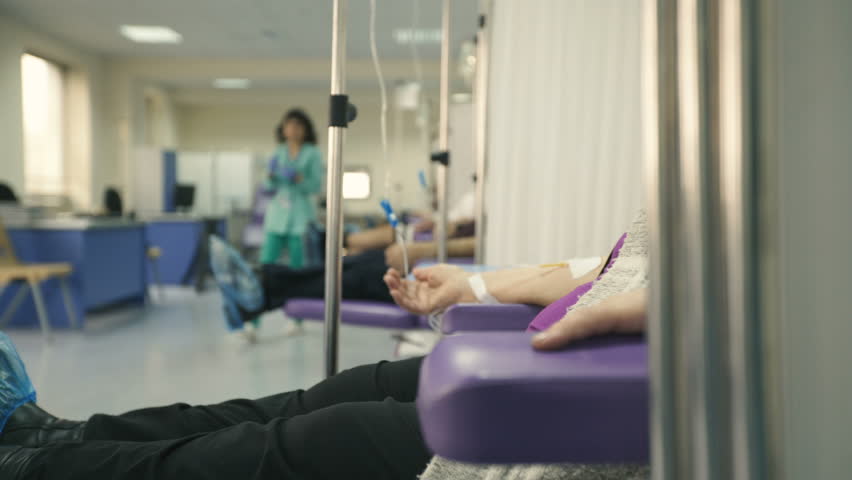 Chemotherapy room. Patient receiving drugs | Shutterstock HD Video #1026783731