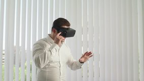 Man Wears Virtual Reality Glasses. Life In The Virtual World.