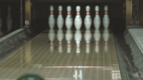 Slow motion shot of a bowling game. Bowling background. Close-up. Bowling alley