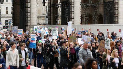 London, UK - March 15 2019: The School strike for climate, the studentes protest in the street in London