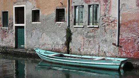 01 April 2019 - Venice, Italy - Unknown tourists among the streets and canals of the lagoon city