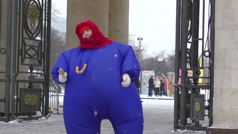 MOSCOW, RUSSIA - 18 FEBRUARY 2018: Dancing animator at the main entrance to Gorky Park in Moscow.