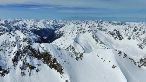 Stunning aerial drone panoramic footage of the Stubai Alps mountain range just below the summit of Schrankogel mountain (3497m).Stubai alps are located in Austria, in Central Eastern Alps of Europe.