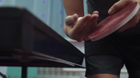 table tennis game serve concept. slow motion video. blurred focus on the grid. man playing training serve ball in table tennis the sport active lifestyle - Powered by Shutterstock - Get 15% off with code: PIKWIZARD15