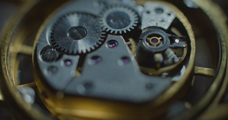 Old clock mechanical part working mooving white lightning from right side static angle view ProRes 4444