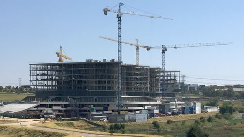 Johannesburg, South Africa, 27th March - 2019: Office building under construction with heavy lifting cranes