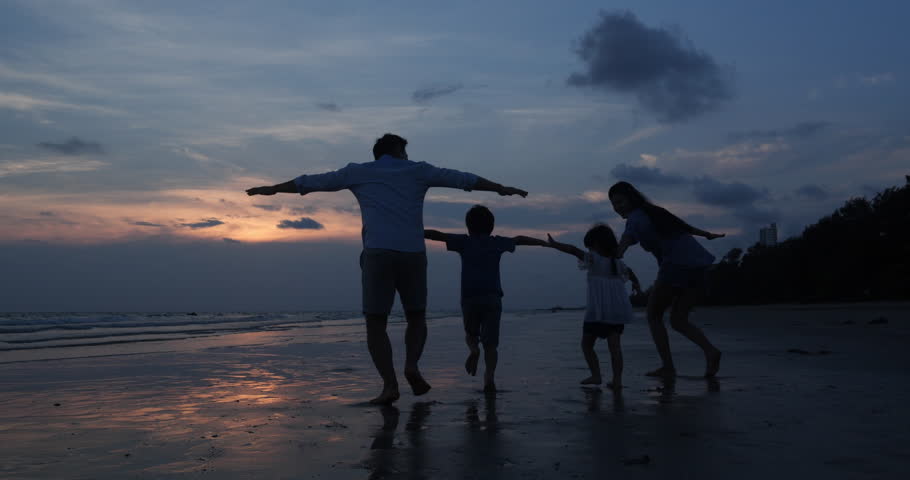 SLOW MOTION, Silhouetted Asian family running together at Beach. Family, Freedom and Travel concept. | Shutterstock HD Video #1026856232