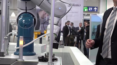 HANNOVER / GERMANY - APRIL 02 2019 : Staeubli is presenting the newest generation of cobots - Collaborative robots - at the HANNOVER FAIR.