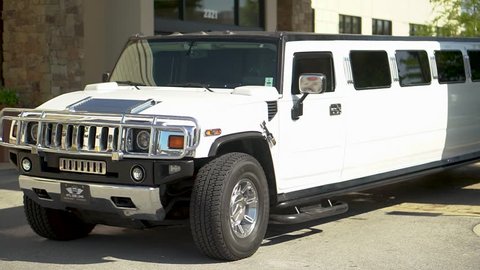 Chattanooga, TN / United States - 04 28 2018: hummer limo driving out