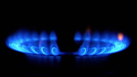 HD - Slow ignition of a blue flame on gas stove