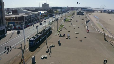 Blackpool, Lancashire - 25th March 2019 - Aerial footage, view of Trams, trains, buses public transport in the famous city centre of Blackpool, the beautiful seaside resort in the United Kingdom