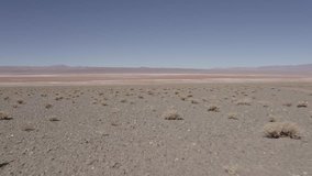 Aerial, Salar De Pocitos, Argentina - flat version. This clip is available in three different gradings - native 10Bit HLG (H265) or flat, cine grading and neutral grading.