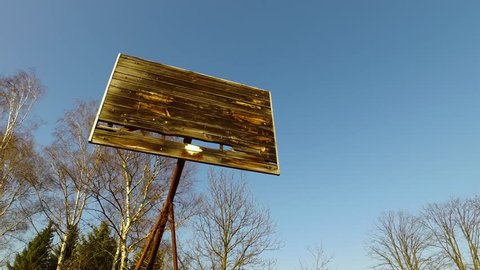 Abandoned Destroyed Basketball Backboard Without Basket and Net on Field Moving Shot on Sunny Afternoon 4k