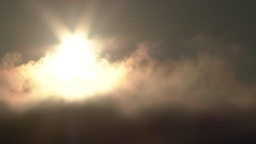 Time lapse with fog and clouds passing through sky as sun sets at the Oregon Coast.