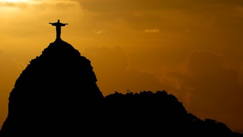 Rio de Janeiro, October 2012: Christ the Redeemer Landmark Monument on Corcovado Overlooking the Landscape at Sunset, South America, Brazil