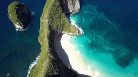 Drone aerial view of idyllic tropical beach on Nusa Penida Island part of Bali.
Stunning drone shot high angle view of pinnacles formation on blue turquoise sea in Indonesia.