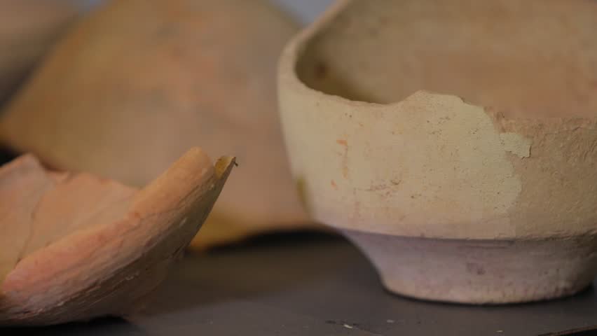 View of the ancient clay works. Manual work. Clay jars, vessels. Eastern craft
