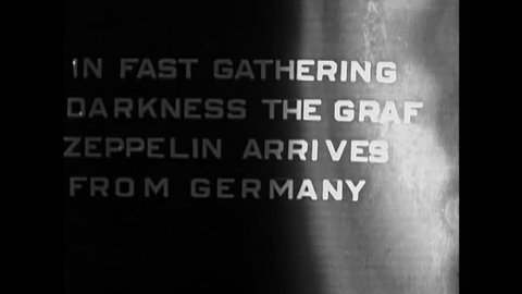 CIRCA 1928 - US Navy sailors congregate at the Lakehurst air field to see the Graf Zeppelin, visiting from Germany.