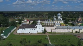 Tikhvin Assumption monastery, July Sunny day. Tikhvin, Russia (aerial video) 