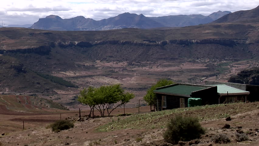 African Mountain Landscape with houses in the foreground.