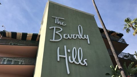 LOS ANGELES, March 30th, 2019: Low angle extreme close up shot of the Beverly Hills Hotel facade, against a blue sky. The iconic hotel is owned by the Sultan of Brunei.