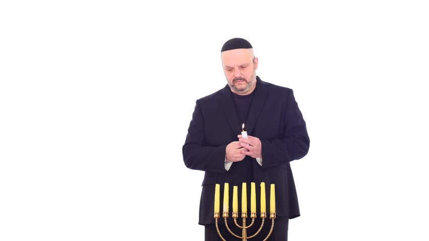 Jewish man in suit near Menorah - white screen background ritual Royalty-Free Stock Footage #1026955130