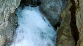 Natural waterfall inside the cave, 4k Video Clip