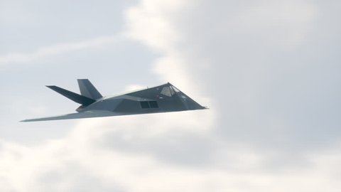 Military F-117 Nighthawk Stealth Attack Aircraft Flying In The Sky. High Quality animation in ProRes 4444 codec, 25 FPS.