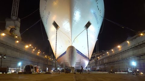 Freeport, Grand Bahama - MAR 13, 2019: Royal Caribbean cruiseship Grandeur of the Seas in drydock in night during repair