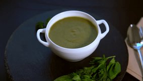 Bowl of healthy broccoli and spinach soup