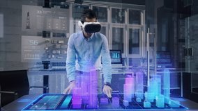 Professional Male Architect wearing Augmented Reality Headset makes gestures and redesigns 3D City Model. High Tech Office use Virtual Reality Modeling Software Application. - Powered by Shutterstock - Get 15% off with code: PIKWIZARD15