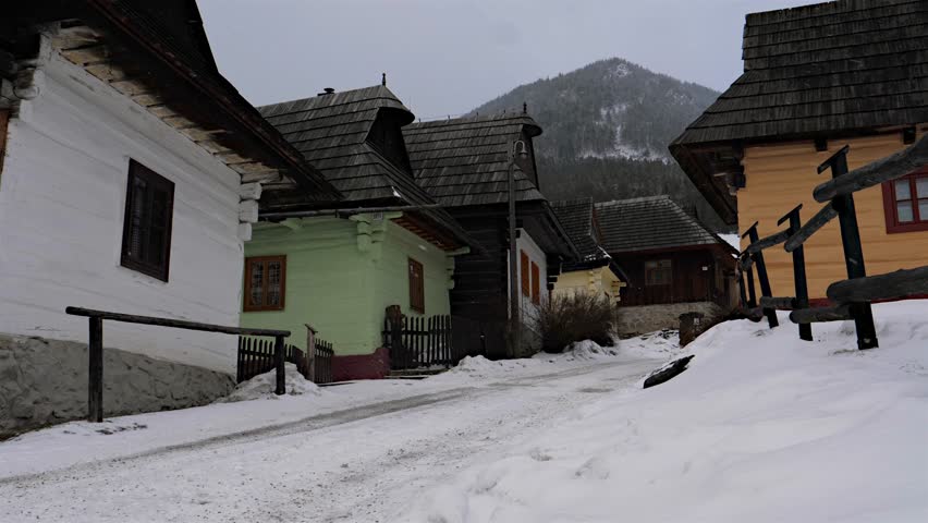 snowing village, wooden heritage houses
