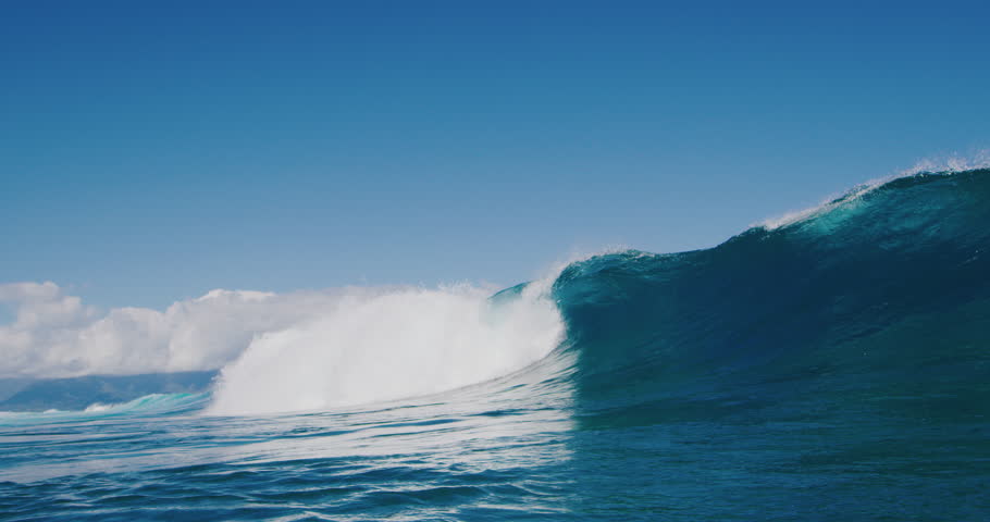 Powerful ocean wave breaking, deep blue wave barrel in warm tropical waters, blue planet | Shutterstock HD Video #1027016186