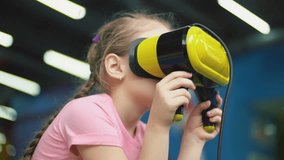 girl plays with virtual glasses