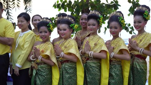 A group of Thai girls and ledyboy in national costumes, Suanthai. Pattaya, Thailand, 03.04.2019