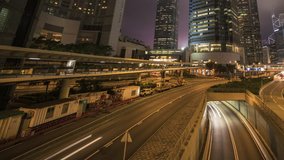 Hong Kong city motion time lapse scene of transportation traffic in night time at central area in Hong Kong island urban area 4k video