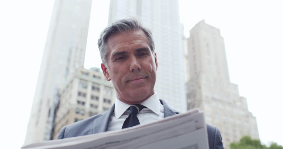 Senior businessman in New york street, wall street district. Daily life of a successful business man Royalty-Free Stock Footage #1027035308