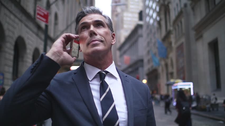 Senior businessman in New york street, wall street district. Daily life of a successful business man Royalty-Free Stock Footage #1027035323