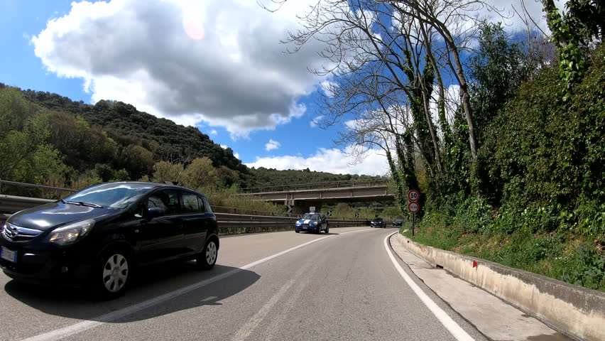 Driving in a beautiful cloudy and sunny day