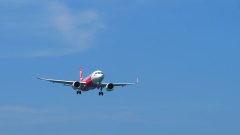 PHUKET, THAILAND - NOVEMBER 30, 2018: AirAsia Airbus 320 NEO HS-CBK approaching before landing, International Phuket Airport