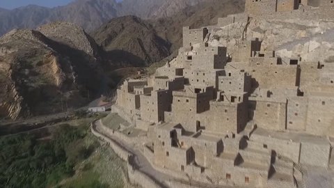 Dhy Ain Village, Al-Baha, Saudi Arabia. (aerial photography) about 20 kilometers from Manhwa and 24 kilometers from Bach. It originated in AH in the 10th century and lasts more than 400 years. 