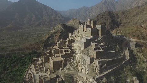 Dhy Ain Village, Al-Baha, Saudi Arabia. (aerial photography) about 20 kilometers from Manhwa and 24 kilometers from Bach. It originated in AH in the 10th century and lasts more than 400 years. 