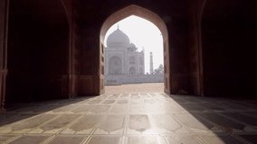 Follow me to the Taj Mahal, India. Female tourist leading boyfriend to there magnificent famous Mausoleum in Agra. People travel concept .leading the way