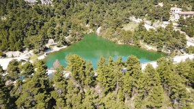 Aerial drone video of famous lake Beletsi in Parnitha mountain, Ipokrateios Politeia, Attica, Greece