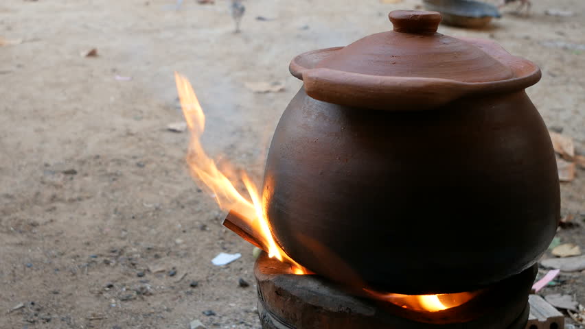 Clay Pot Located On Fireplace Firewood, Can You Use A Clay Pot As Fire Pit