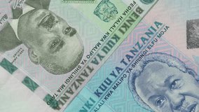 Tanzania shilling notes rotating. Tanzanian money, currency. 4K stock video footage