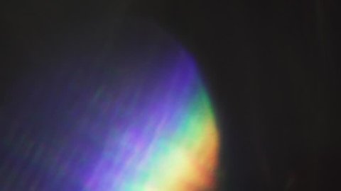 Dreamy iridescent creative background, natural bokeh, light beams. 3840x2160 footage.