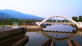4K video of Thachompoo bridge or white bridge with railway in Lamphun province, Thailand.