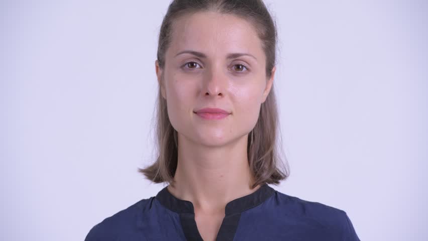 Face of happy young beautiful businesswoman ssmiling